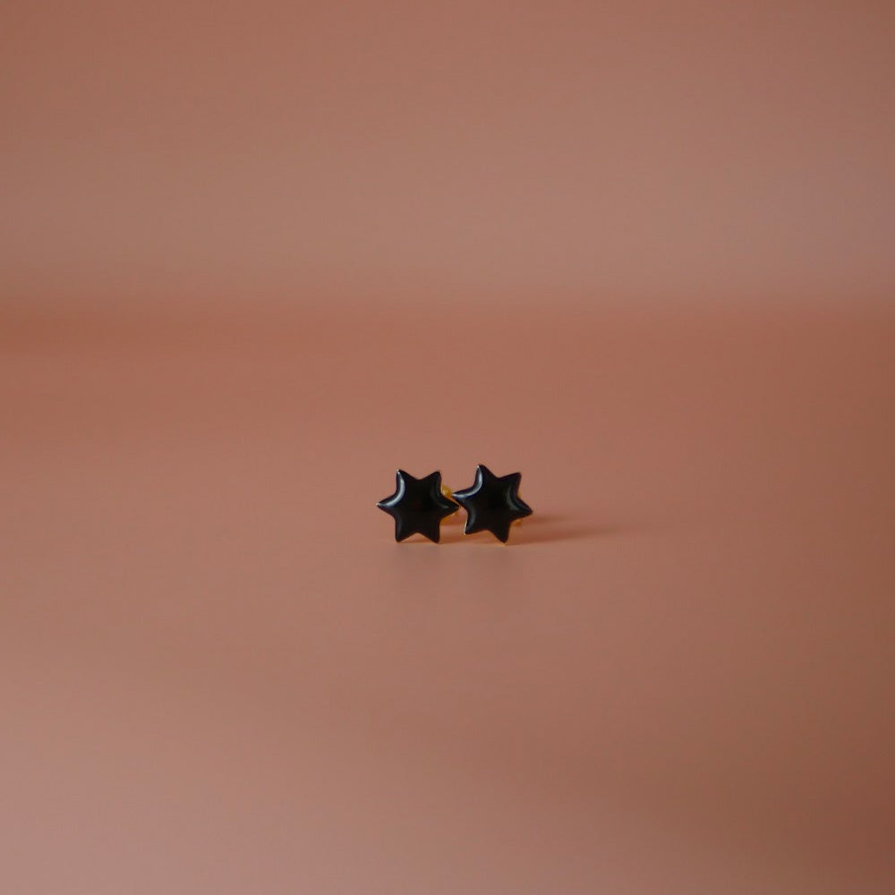 Black pair of Jewish star studs in enamel