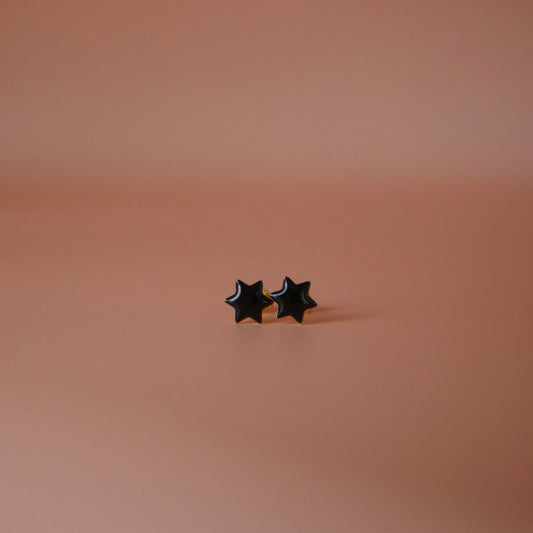 Black pair of Jewish star studs in enamel