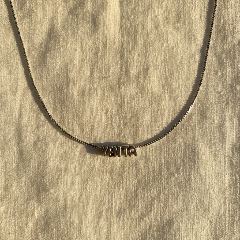 Silver Bubble Letter Yenta necklace on box chain