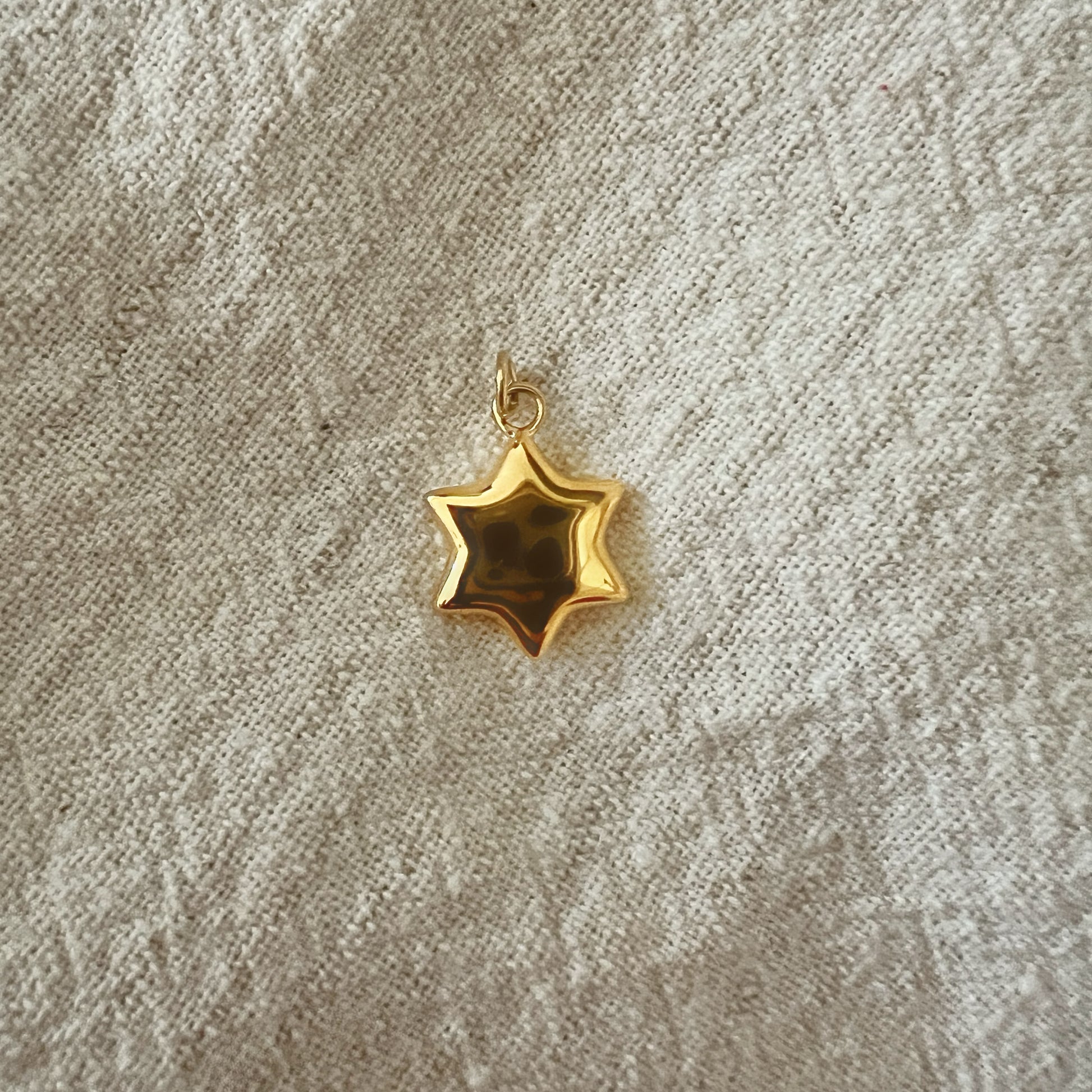 Bubble jewish star charm in gold 