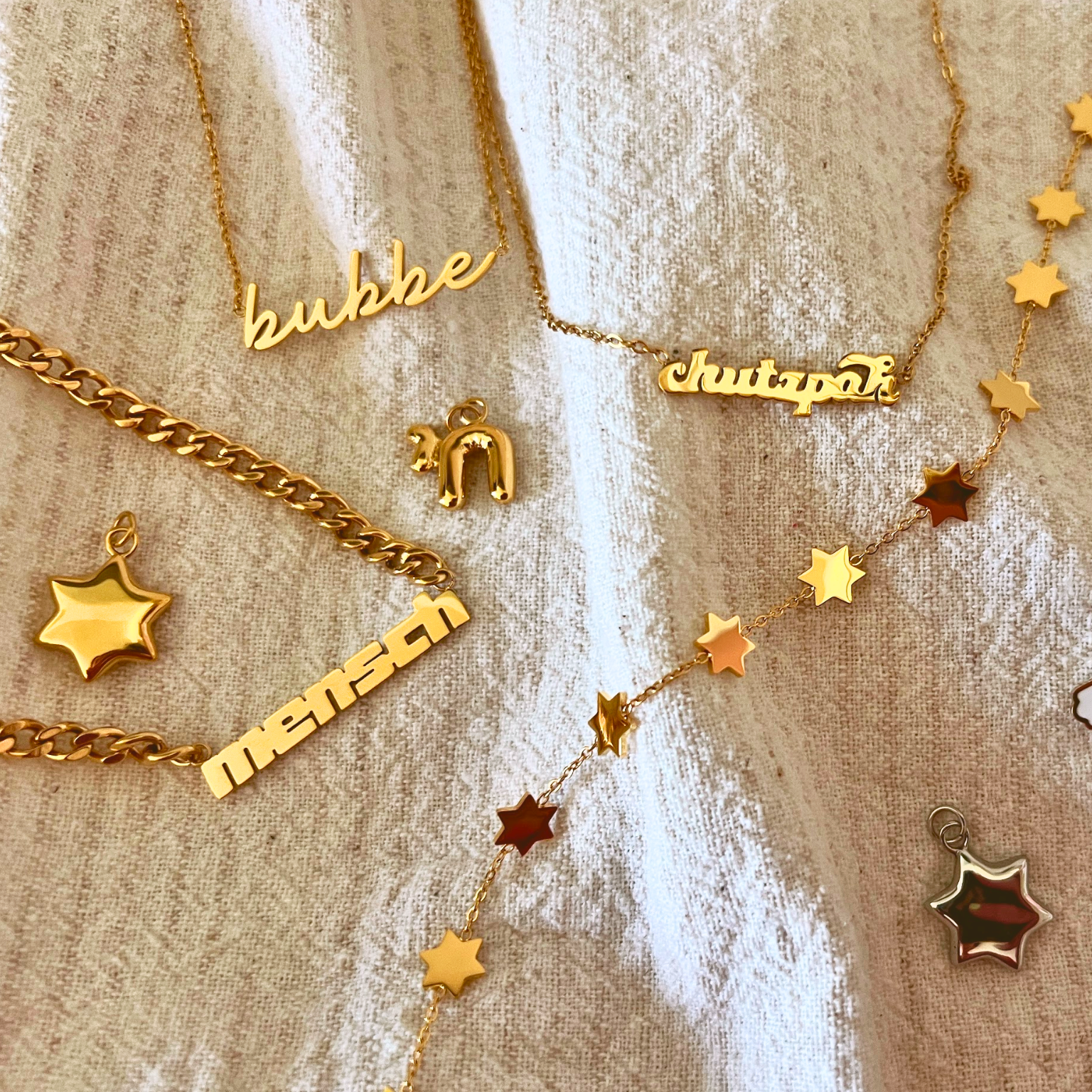 Mamaleh jewelry flat lay